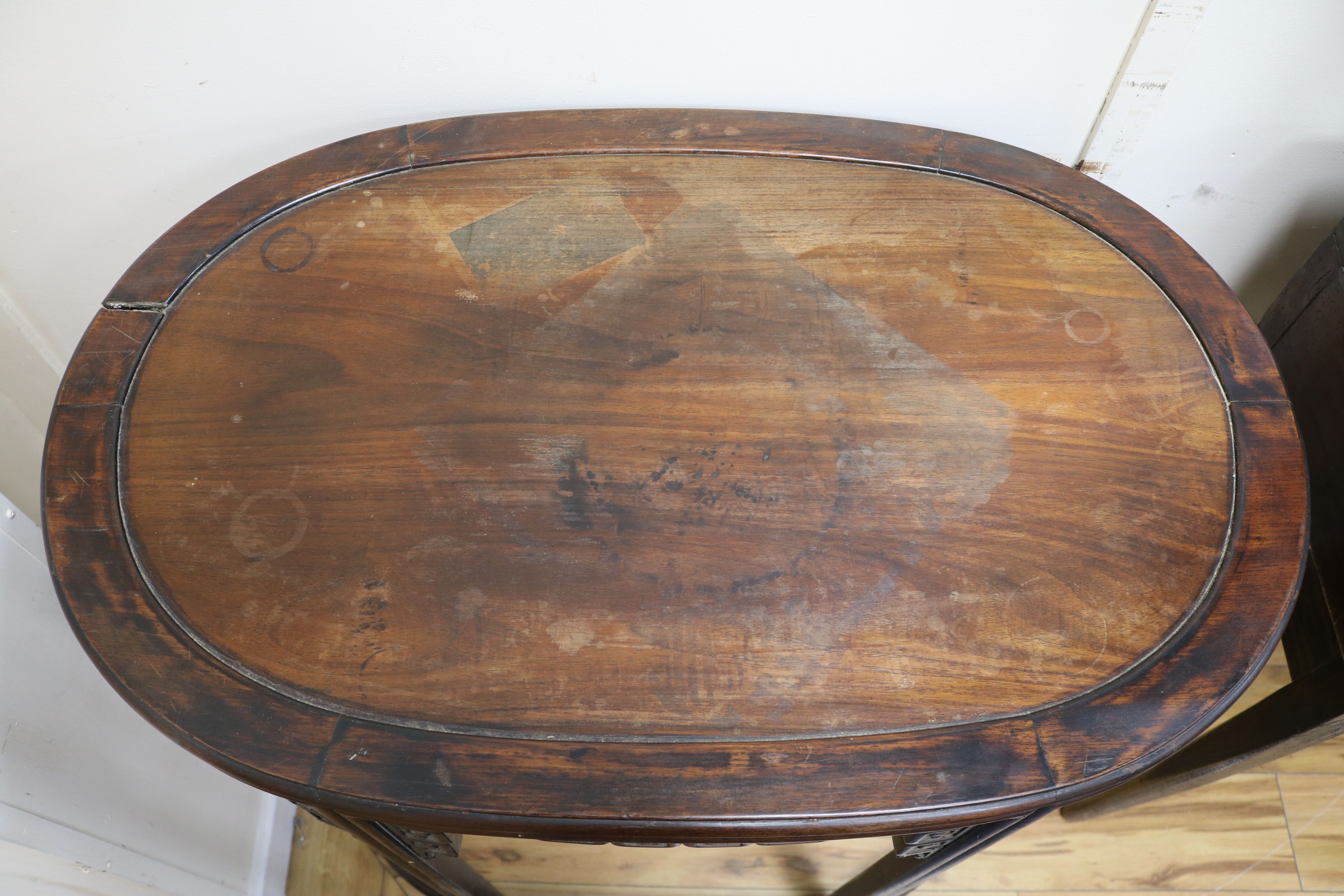 A Chinese carved hardwood oval pedestal table with pierced frieze and peripheral stretcher W.87cm - Image 2 of 8