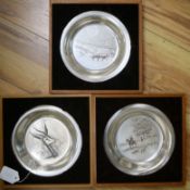 A set of three silver James Wyeth commemorative plates, in boxes, 20cm, gross 18.5 oz.