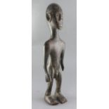 A Bambara People of Mali carved wood ancestral figure, height 56cm