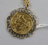A 1909 gold full sovereign in pendant mount, with 9ct gold chain.