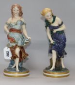 A pair of Royal Worcester figures after James Hadley, 'Before the Wind' and 'After the Wind', each