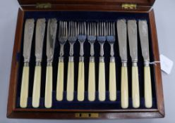Twelve pairs of silver-bladed fish eaters, cased