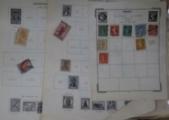 A stamp album and loose stamps