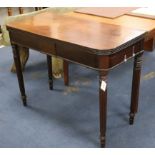 A mahogany tea table with reeded legs W.101cm