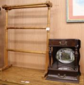 A Victorian ebonised two tier bedside table and a towel rail W.34cm and W.62cm