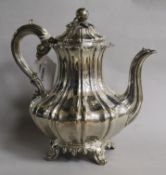 A William IV silver melon-shaped coffee pot, the hinged cover with apple terminal, original filter