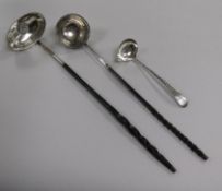 A Scottish silver toddy ladle, Edinburgh 1804 and two Georgian toddy ladles with whalebone handles