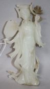 A Chinese white jade figure of an immortal
