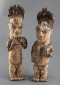 A pair of Ibo People of Nigeria painted terracotta figures, 34cmProvenance: Ex. Collection of Mike