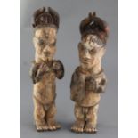 A pair of Ibo People of Nigeria painted terracotta figures, 34cmProvenance: Ex. Collection of Mike