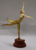 An Art Deco bronze and carved ivory figure 'Butterfly dancer, by Prof Otto Poertzel width 26cm