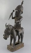 A large Benin bronze figure of a horse and rider, representing an armed messenger of King Oba,