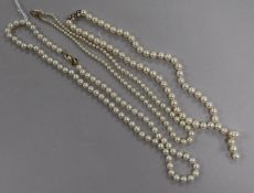 A Mikimoto single strand cultured pearl necklace with 14ct gold clasp and two other single strand