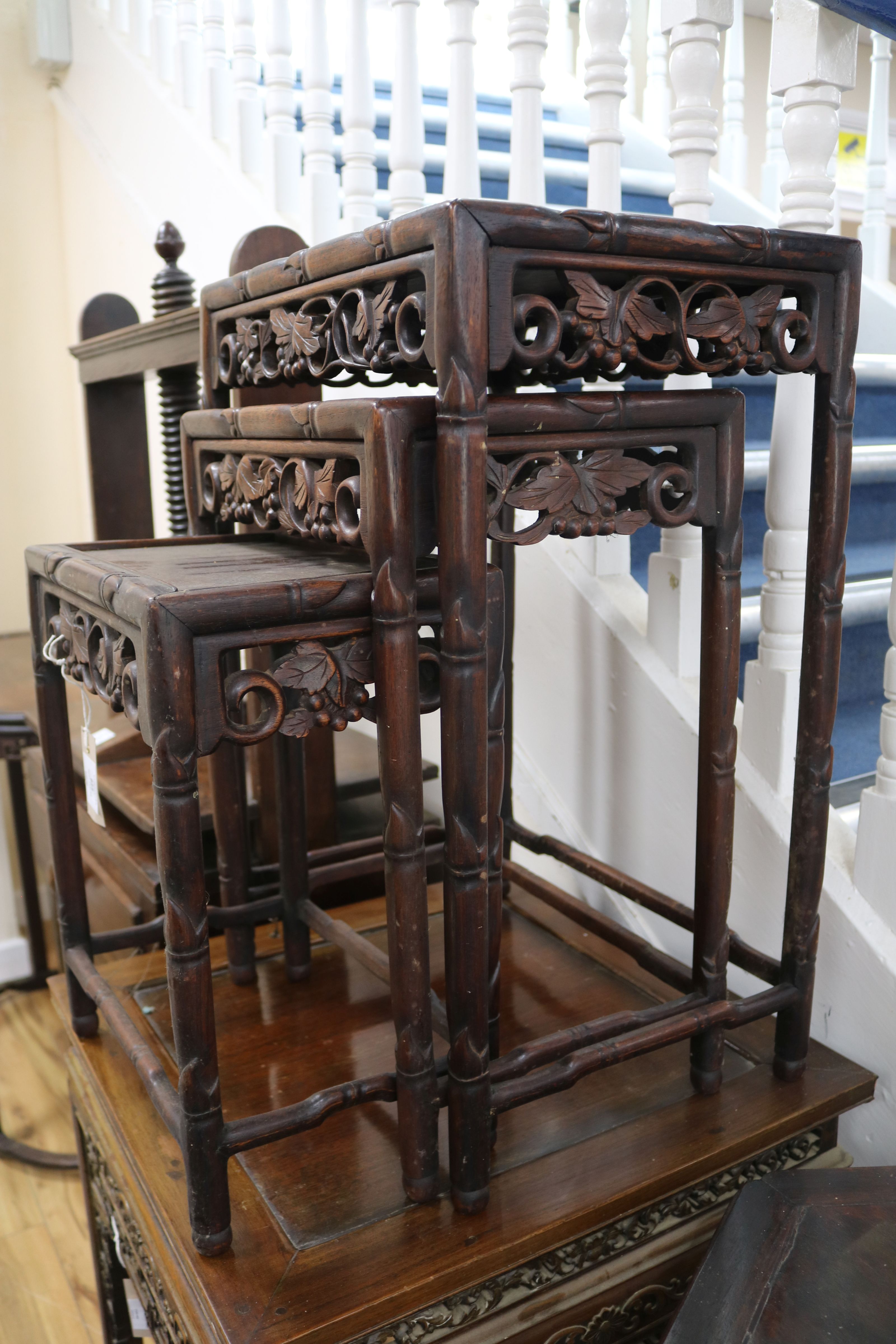 A Chinese nest of four carved hardwood tea tables (the largest a.f.) W.44cm - Image 6 of 6