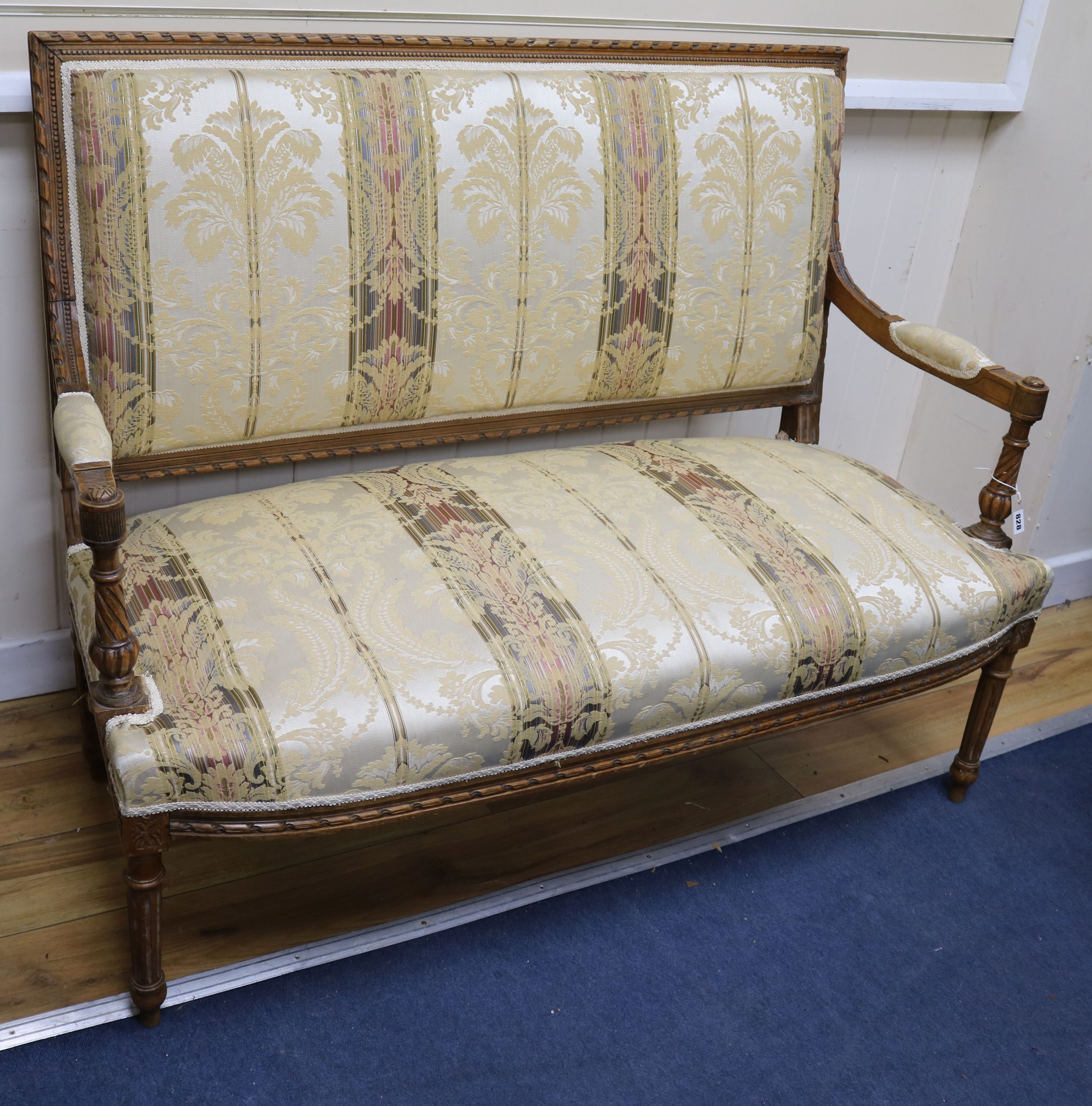 An upholstered carved frame settee W.125cm