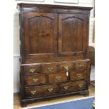 A George II oak press cupboard W.135cm