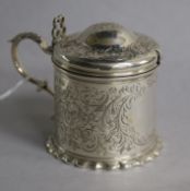 A Victorian engraved silver mustard pot, John Keith, London, 1850, 79mm.