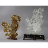 A Chinese rock crystal carving and a chalcedony vase and cover.