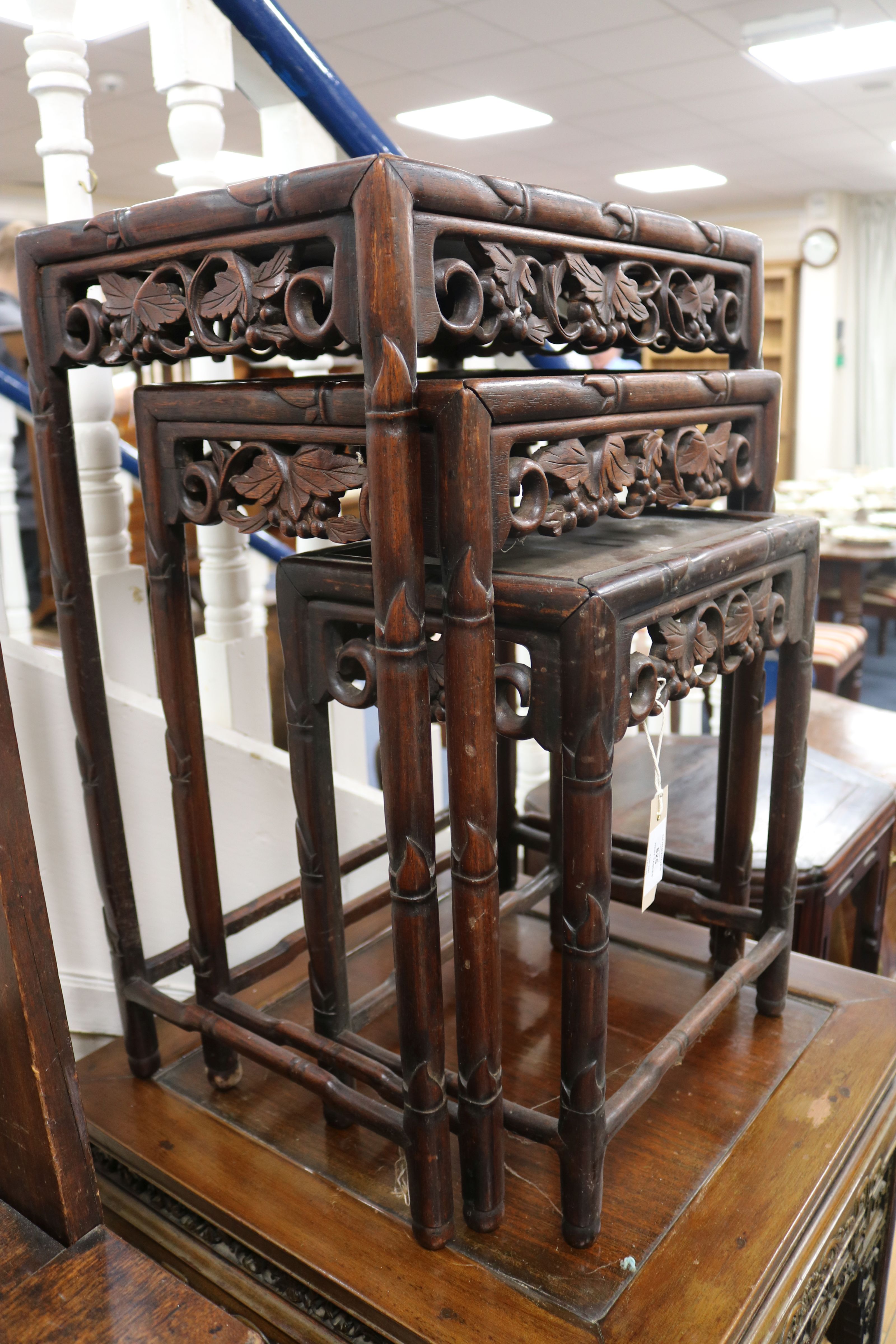 A Chinese nest of four carved hardwood tea tables (the largest a.f.) W.44cm - Image 3 of 6