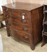 A George III inlaid mahogany serpentine chest fitted four graduated long drawers W.115cm