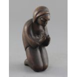 An African carved hardwood figure of a praying woman, 17cm