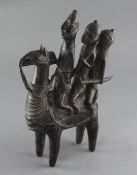 A Lake Chad probably Bornu People bronze group of a camel with three riders, 31cmProvenance: Ex.