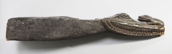 A Sepik River crocodile and frog canoe prow, 84cm