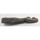 A Sepik River crocodile and frog canoe prow, 84cm