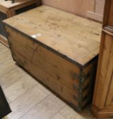 A large metal bound pine chest W.102cm