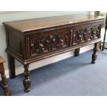 A small Jacobean style oak dresser with geometric moulded drawer fronts W.157cm