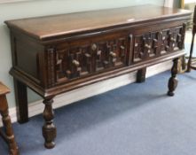 A small Jacobean style oak dresser with geometric moulded drawer fronts W.157cm