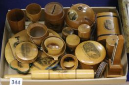 A collection of Victorian Mauchline ware items, including needle thermometer, two plates, sewing