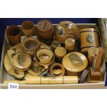 A collection of Victorian Mauchline ware items, including needle thermometer, two plates, sewing