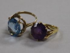 An 18ct gold and amethyst ring and a 9ct gold and gem set dress ring.