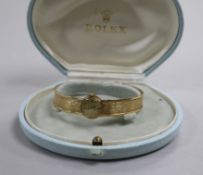 A lady's Rolex 9ct gold Precision wristwatch with woven bracelet