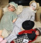 A German bisque-headed doll, no. 966 and two other dolls, including a large bisque head doll with