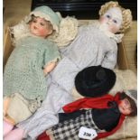 A German bisque-headed doll, no. 966 and two other dolls, including a large bisque head doll with
