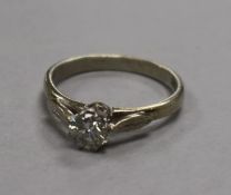 A mid 20th century 18ct white gold and solitaire diamond ring, size M.