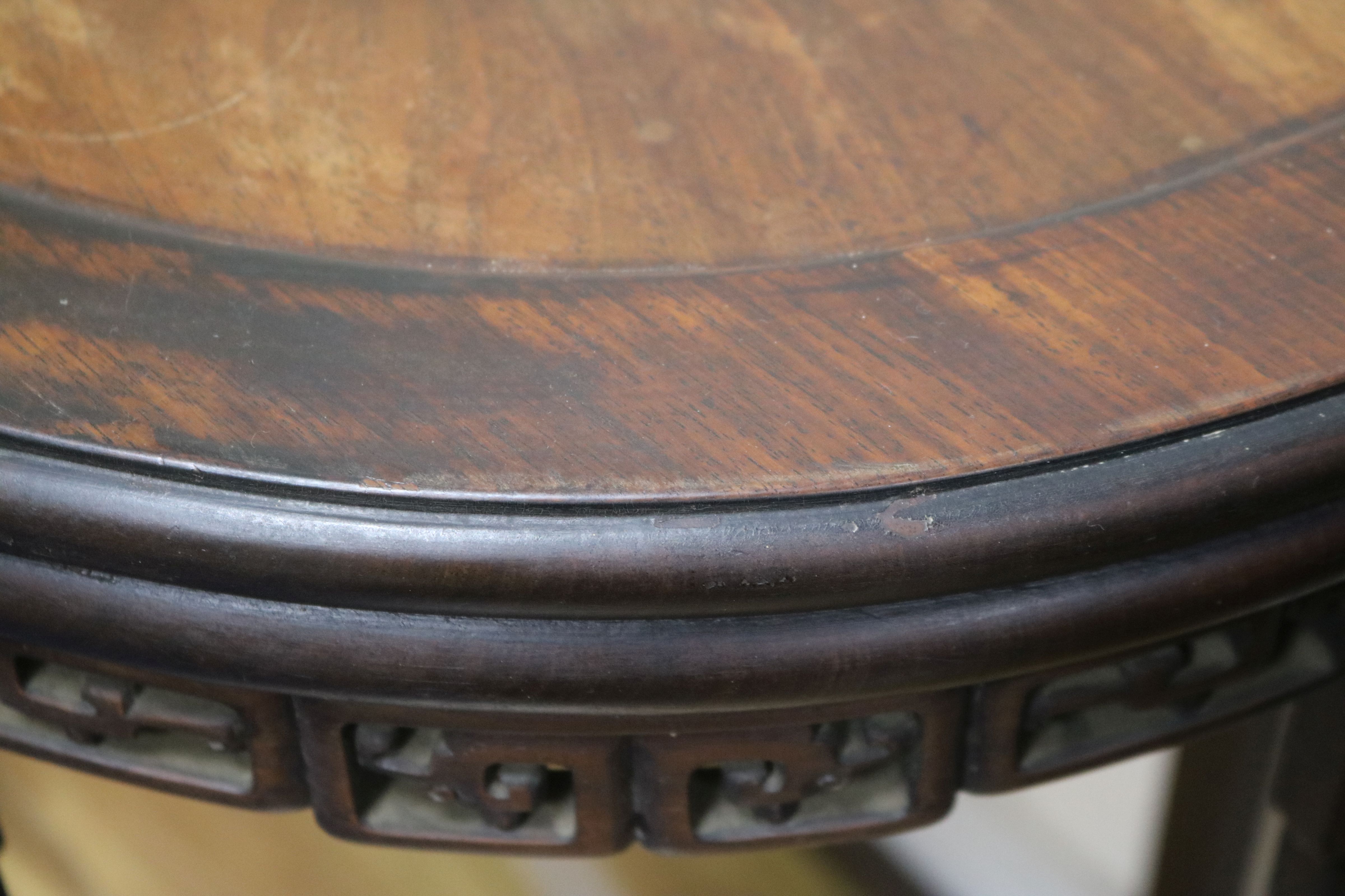 A Chinese carved hardwood oval pedestal table with pierced frieze and peripheral stretcher W.87cm - Image 4 of 8