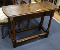 A late 17th century oak gateleg table (flaps deficient) W.95cm