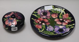 A Moorcroft anemone bowl and cover and a dish