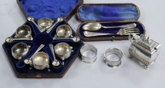 A set of six Victorian silver salts and spoons, cased, a silver mustard and three other items,