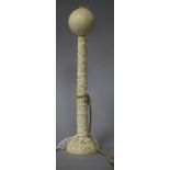 A late 19th century Cantonese carved ivory bibloquet (ball and stand game), height 17cm