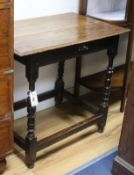 A single drawer oak side table W.76cm