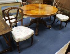 A Victorian walnut breakfast table and four Victorian walnut chairs W.135cm