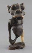 An African hardwood totem figure, 21cm