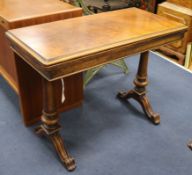 A Victorian walnut card table W.96cm