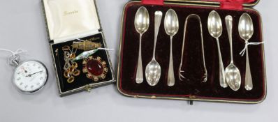 A set of six silver teaspoons and sugar tongs, cased, a 9ct gold bar brooch, a Garrard Incabloc