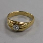 An 18ct gold and claw set solitaire diamond ring, size U/V