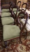 A set of six Victorian mahogany balloon-back dining chairs
